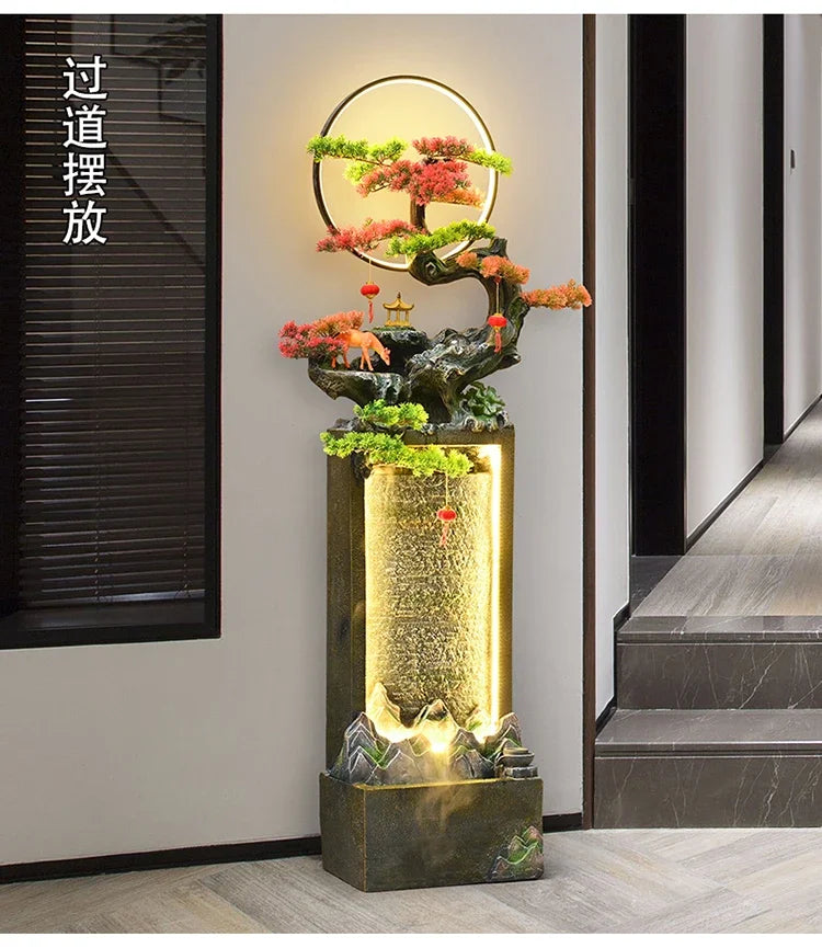 Moonlit Bonsai Waterfall beside a hallway step with a dark window blind and softly illuminated ring.