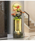 Moonlit Bonsai Waterfall in a lobby beside a staircase, pale stone flooring and a dark marble wall.