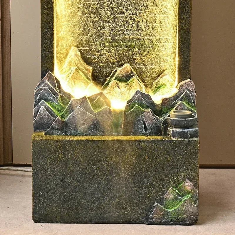 Moonlit Bonsai Waterfall close-up of sculpted mountain peaks, golden illumination and textured dark base.