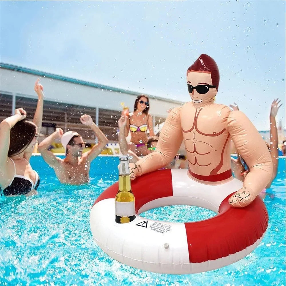 Muscle Man Pool Float floating in a pool with a bottle in its cup holder and party guests behind it