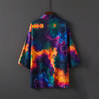 Neon Contour Print Kimono back view on a hanger, with colorful topographic lines across a dark base.