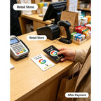Black and white NFC review cards at a retail checkout beside payment equipment