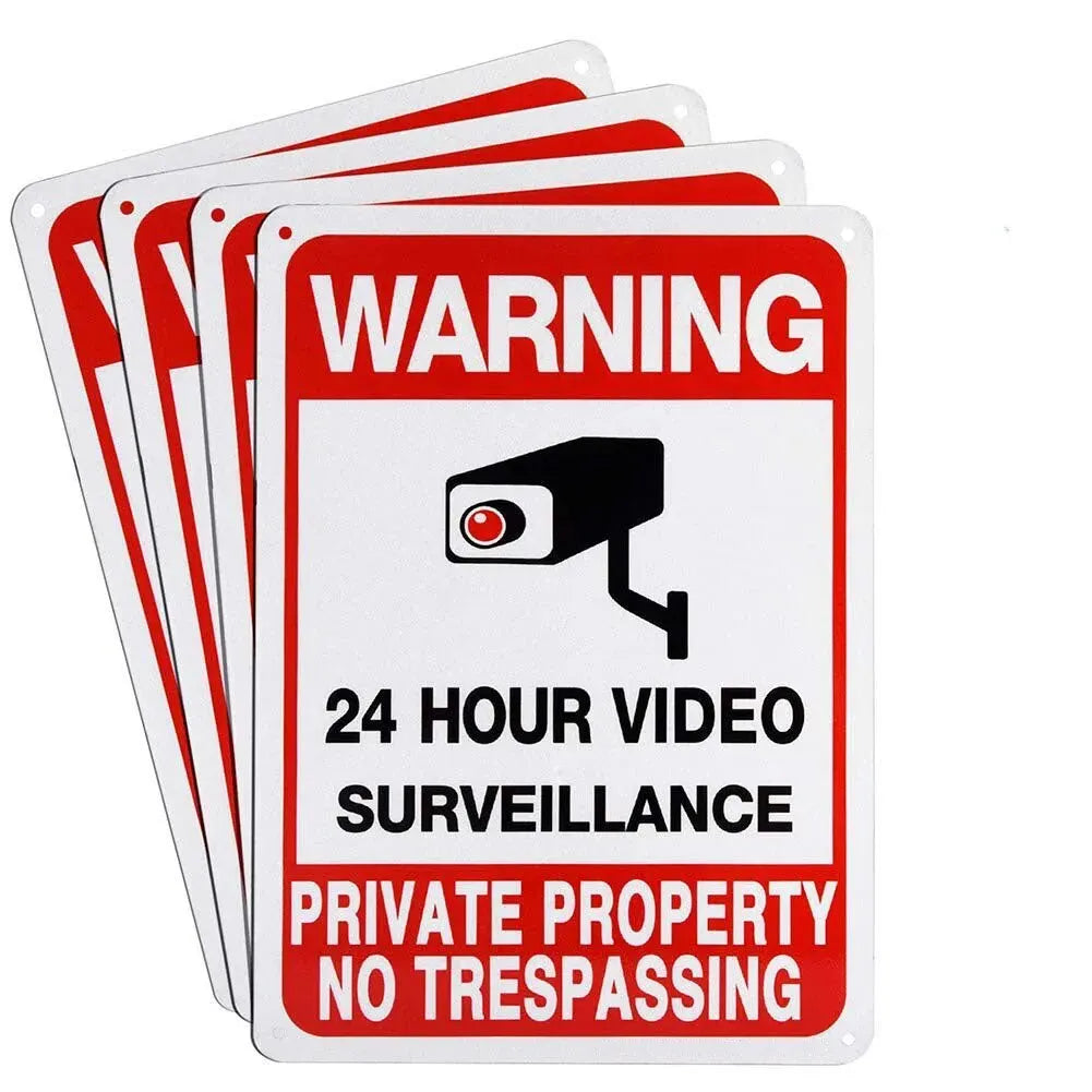 No Trespassing Security Sign shown in a stack of four matching red, white and black signs.