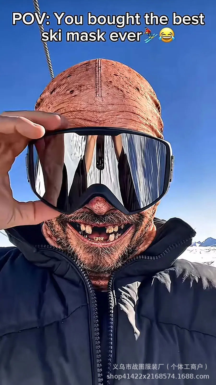 Old Man Ski Mask Missing Teeth style worn with mirrored ski goggles and a black winter jacket
