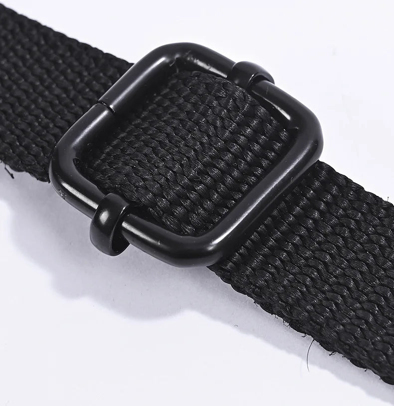 Closeup of the black adjustment buckle and woven strap on the cervical traction sling