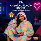 HighPeak Oversized Hoodie Blanket in pastel tie-dye sherpa worn by woman gaming in cozy living room setting
