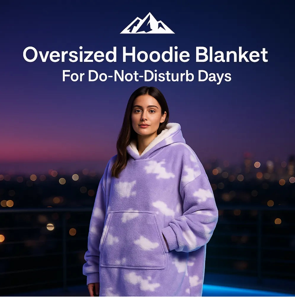 HighPeak Oversized Hoodie Blanket in lavender cloud print worn outdoors at dusk, cozy and oversized fit.