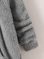 Peekaboo Cat Kids Hoodie close-up of the folded sleeve cuff and gray fluffy texture
