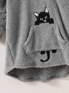 Peekaboo Cat Kids Hoodie close-up of the black cat face, front pocket, paws and tail
