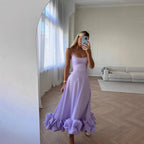 Purple Petal Waltz Ruffle Dress in a wide mirror view showing the flared skirt