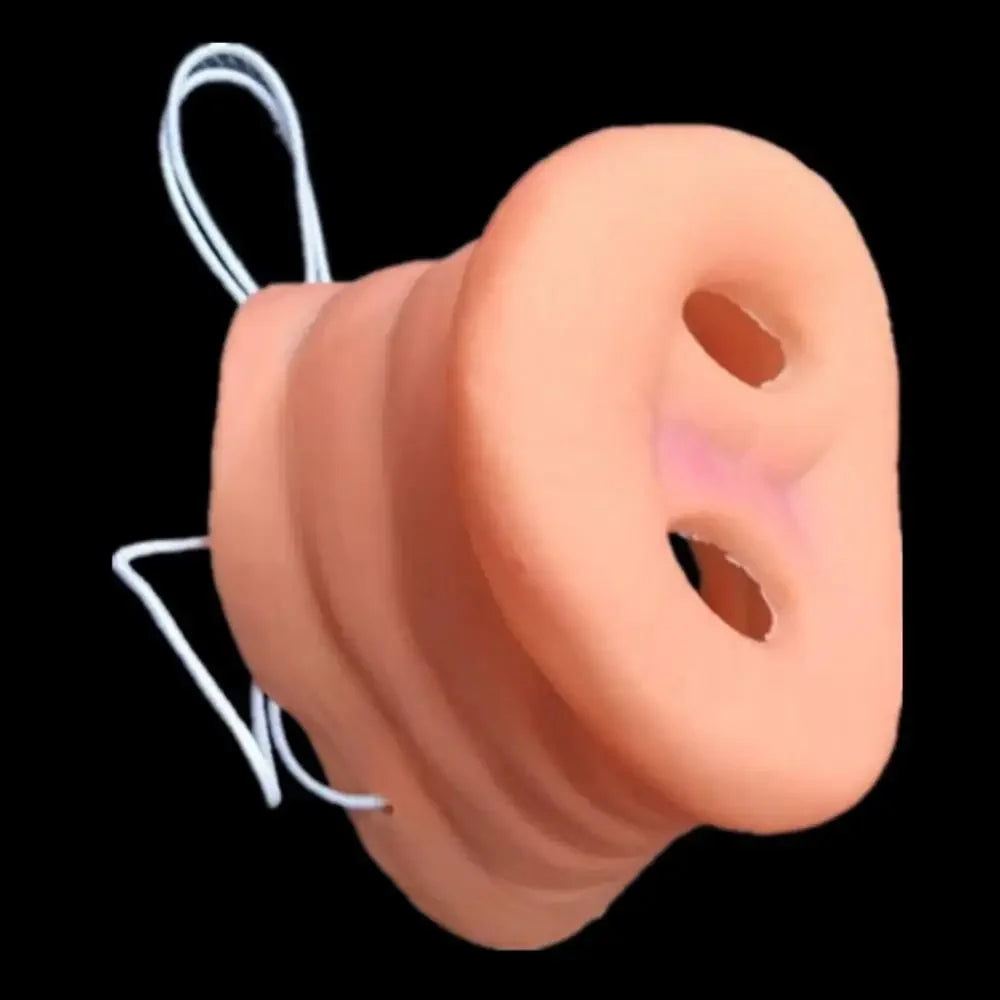 Pig Nose Costume Mask at an angle against black, showing sculpted folds, nostril holes, and white strap.