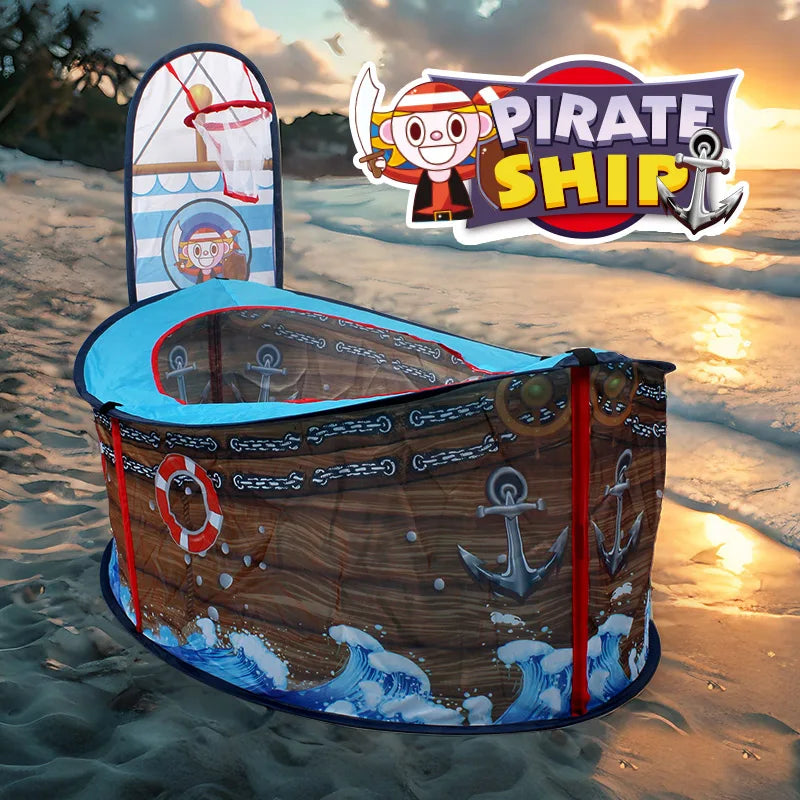 Pirate Ship Play Tent on a sunset beach, showing the open top, anchor prints, and basketball hoop.