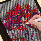 Pixel Mosaic Coloring Book red and purple floral mosaic being filled with a pink marker