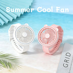 Portable Mini Wrist Fan pink and white fans standing upright with their adjustable wrist straps fastened