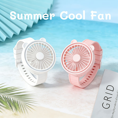Portable Mini Wrist Fan pink and white fans standing upright with their adjustable wrist straps fastened
