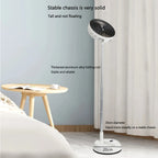 Portable Oscillating Fan fully extended beside a bed with a 20 cm base and folding support rod