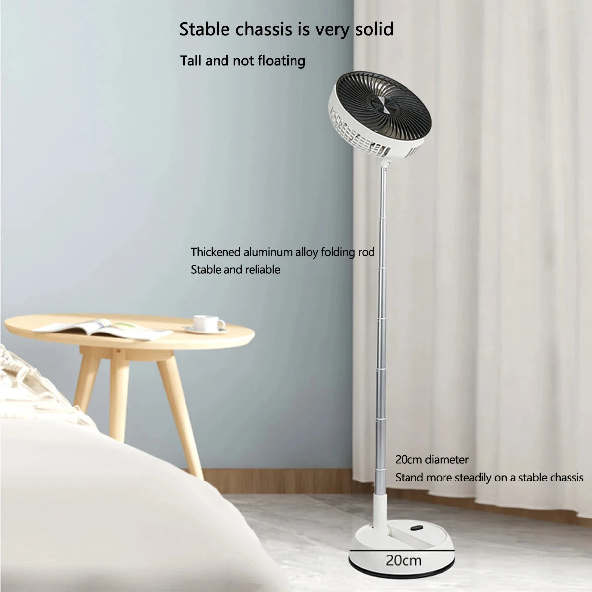 Portable Oscillating Fan fully extended beside a bed with a 20 cm base and folding support rod
