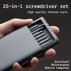 Hand holding the portable 25-in-1 Screwdriver Set with its organized precision bits partly exposed