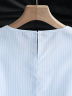 Portofino Ruffle Top back neckline detail showing the keyhole and button closure