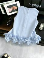 Portofino Ruffle Top back flat lay showing vertical stripes, ruffle hem, and keyhole button closure