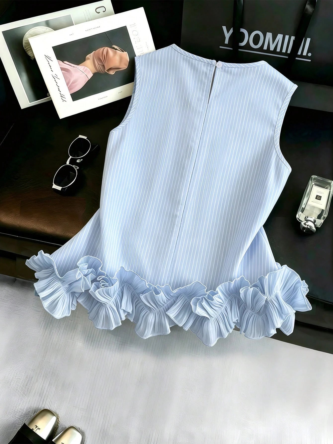 Portofino Ruffle Top back flat lay showing vertical stripes, ruffle hem, and keyhole button closure