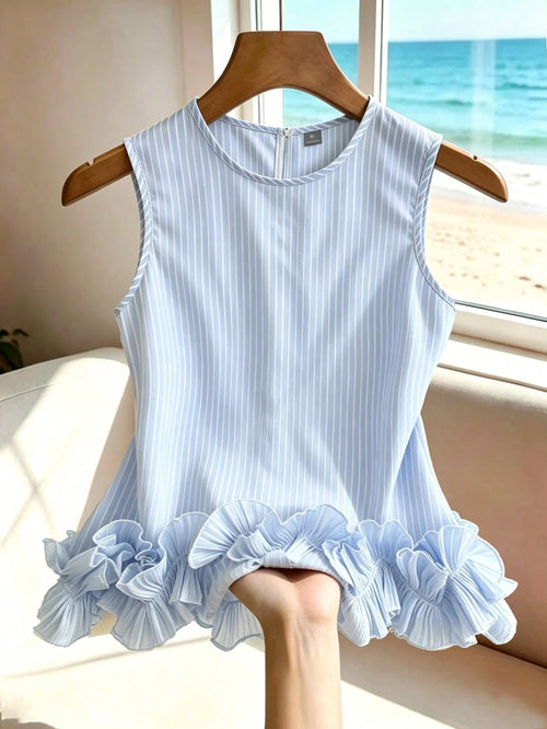 Portofino Ruffle Top front view in light blue and white stripes with a double-layered ruffle hem