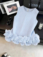 Portofino Ruffle Top front flat lay showing a rounded neckline and dramatic double-layered ruffle trim