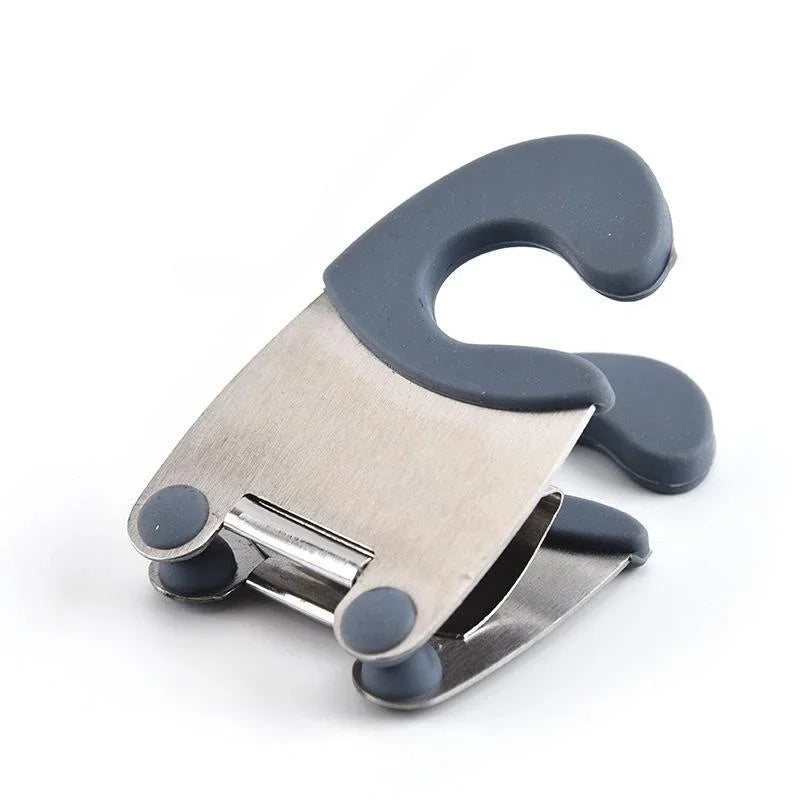 Blue-gray pot clip spoon holder showing the curved rubber cradle and metal clamp