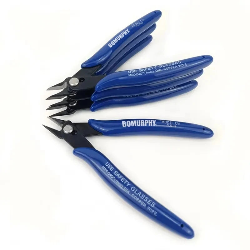 Precision Flush Cutters stacked on a white surface, with one open cutter showing its blue handles and black jaws.