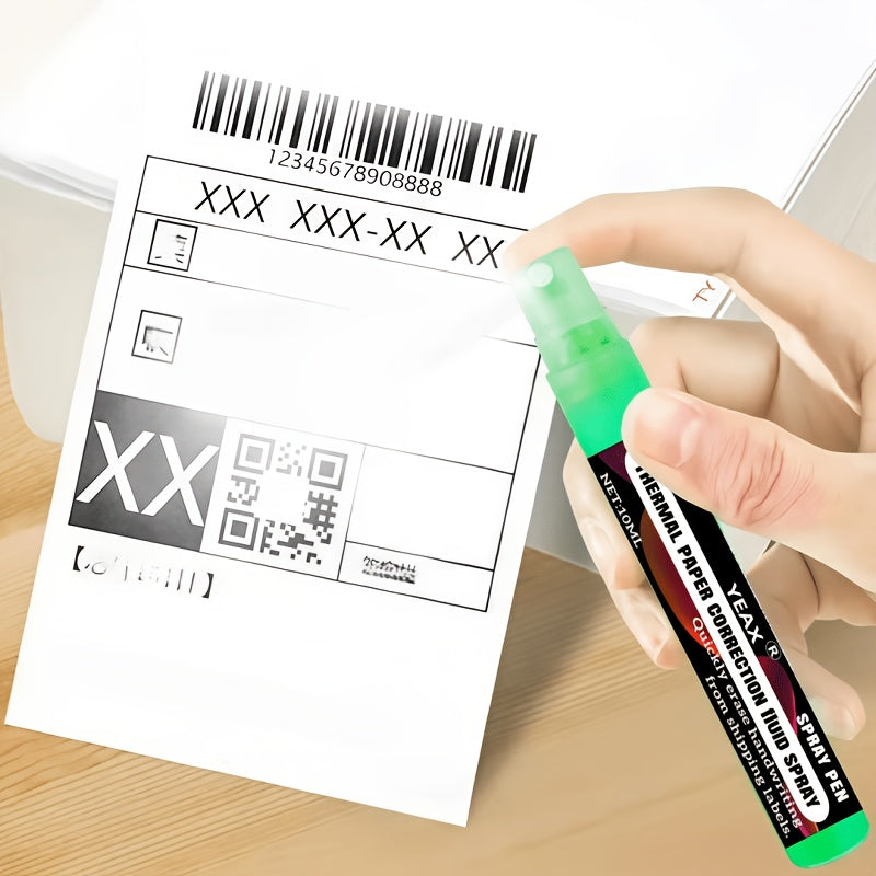 Privacy Eraser Spray Pen held beside an obscured thermal shipping label