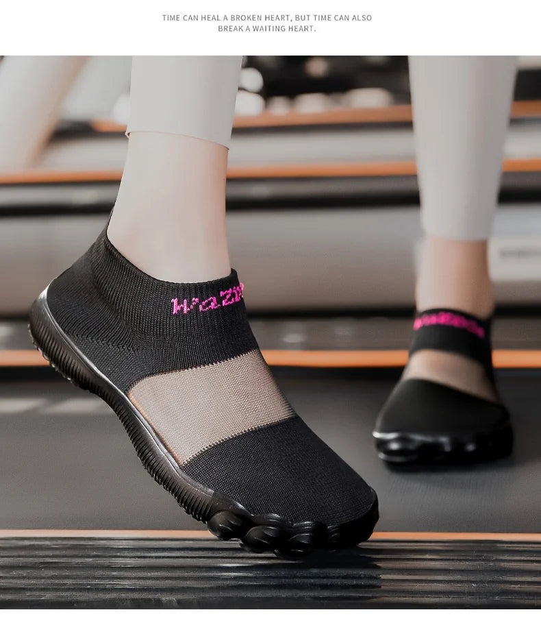 Quick-Dry Water Shoes black pair worn on a treadmill, showing the mesh panels and rounded toes.
