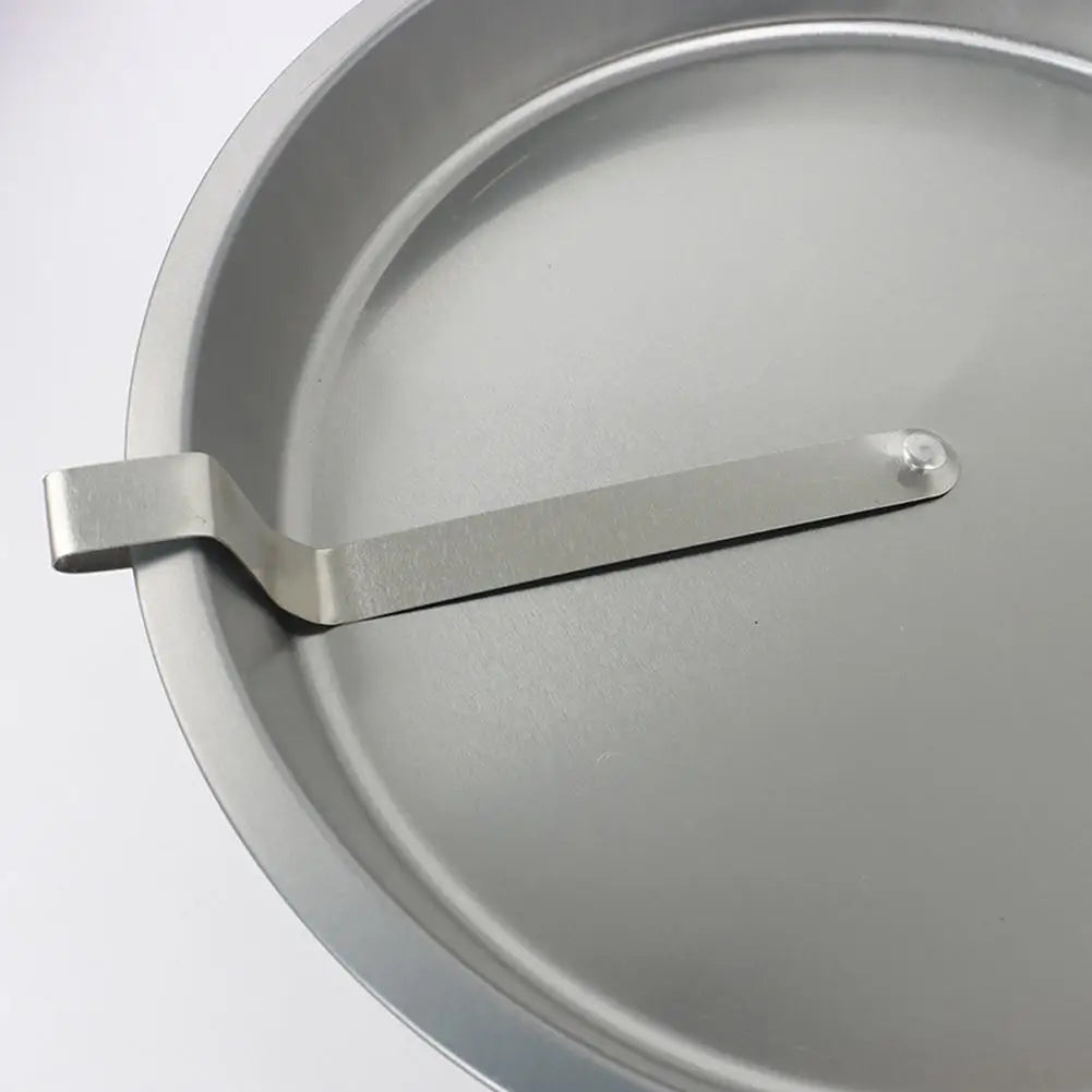Quick Release Cake Pan close-up showing the stainless steel release strip and folded edge