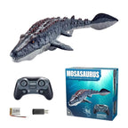 RC Mosasaurus Water Toy set with controller, lithium battery, USB charging adapter, and retail box