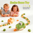 RC Snake Battle Game green and beige snakes with growing tails as two children hold the remote controllers