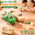 RC Snake Battle Game two children competing with green and beige snakes and magnetic tail pieces on a wooden floor