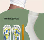 Mid-rise reflexology socks option with printed soles and included massage stick