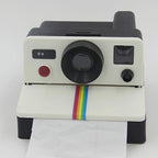 Retro Camera Toilet Paper Holder front view with black-and-white body and rainbow stripe