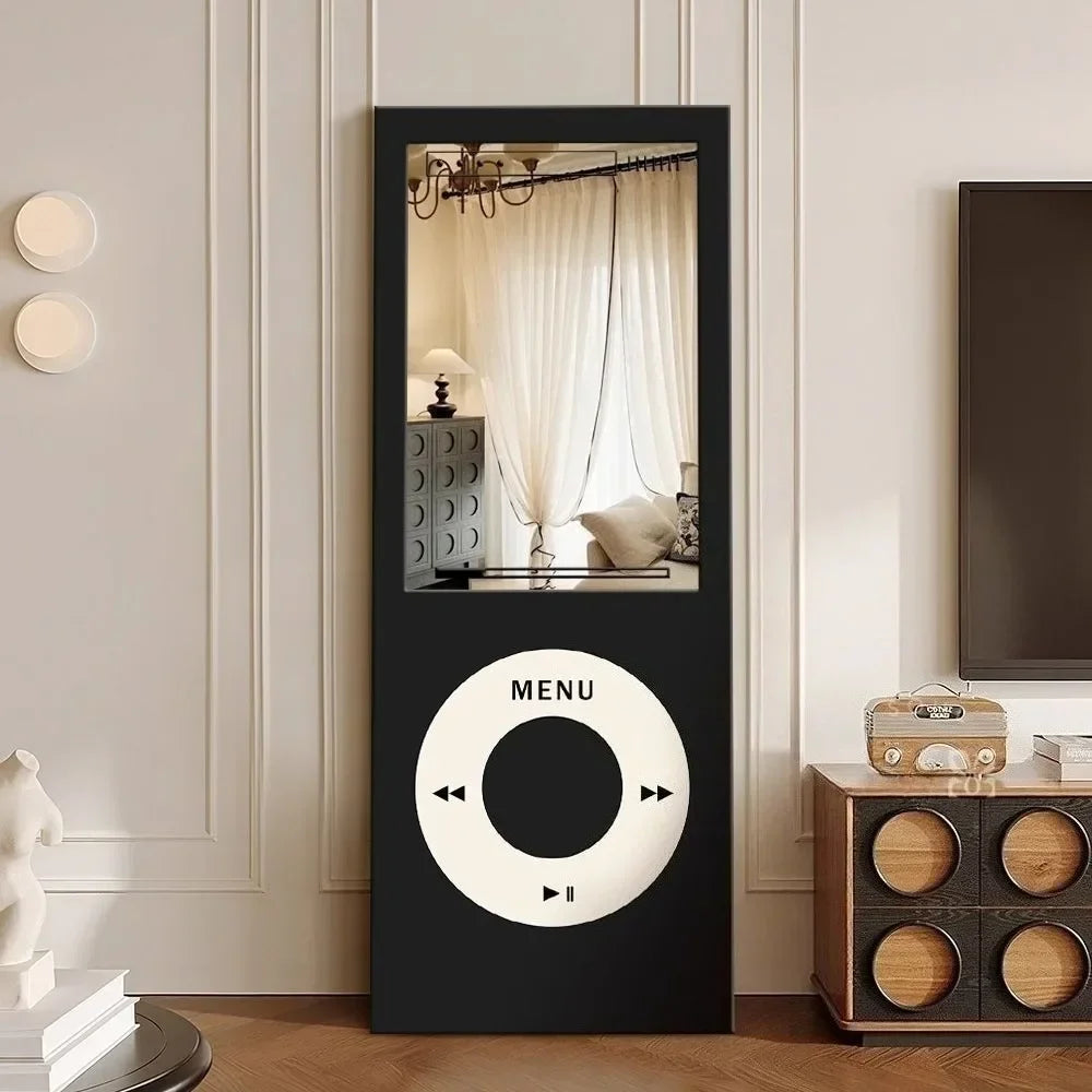 Retro MP3 Wall Mirror in black displayed against a paneled cream wall beside a vintage radio cabinet