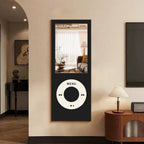 Retro MP3 Wall Mirror in black mounted vertically on a cream wall beside a lamp and vintage-style cabinet