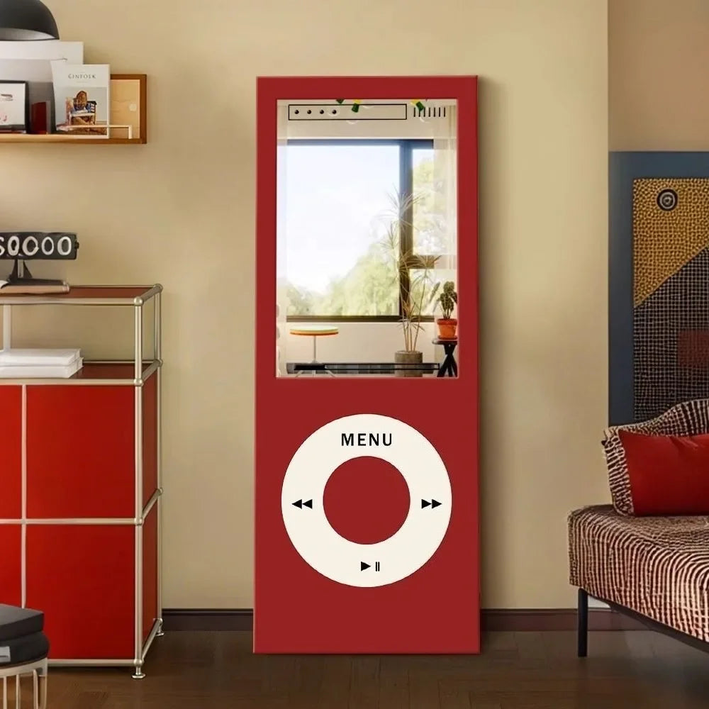 Retro MP3 Wall Mirror in red shown upright beside a matching red cabinet and patterned chair