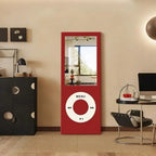 Retro MP3 Wall Mirror in red shown full length between modern black furniture and a metal-framed chair
