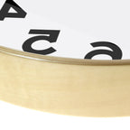 Close-up of the Reverse Number Wall Clock natural wood frame edge