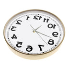 Wooden-frame Reverse Number Wall Clock shown at a low angle on a white background