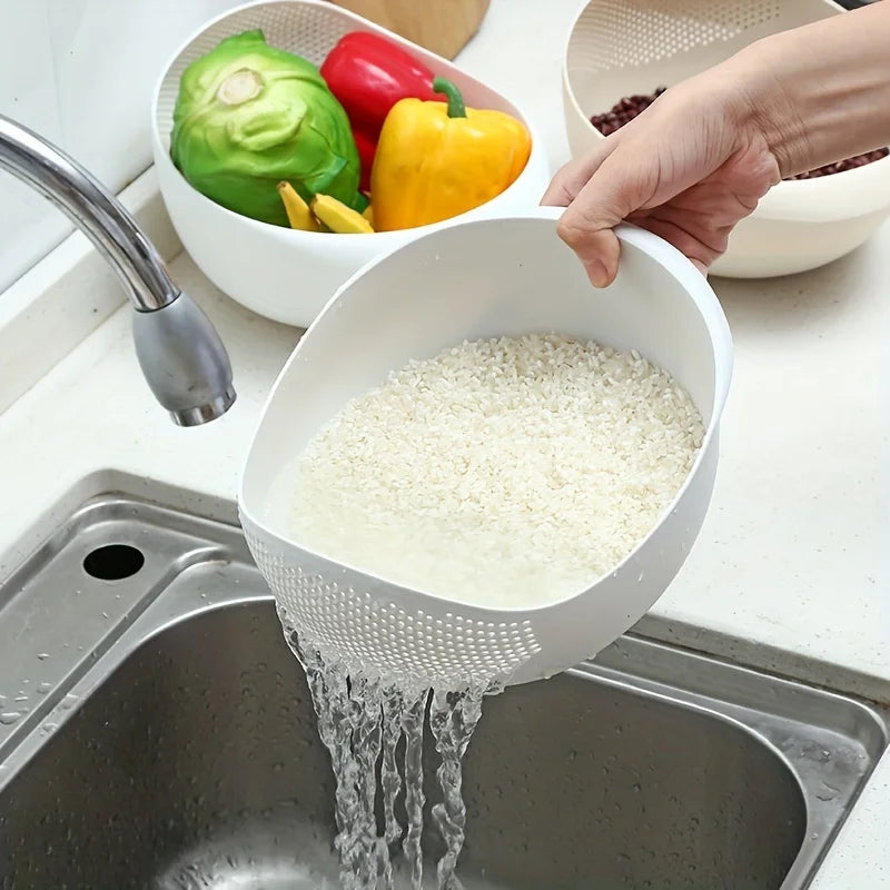 Rice Rinsing Strainer Bowl — White bowl tilted to drain rice over a kitchen sink