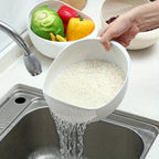 Rice Rinsing Strainer Bowl — White bowl draining rice with peppers and vegetables in the background