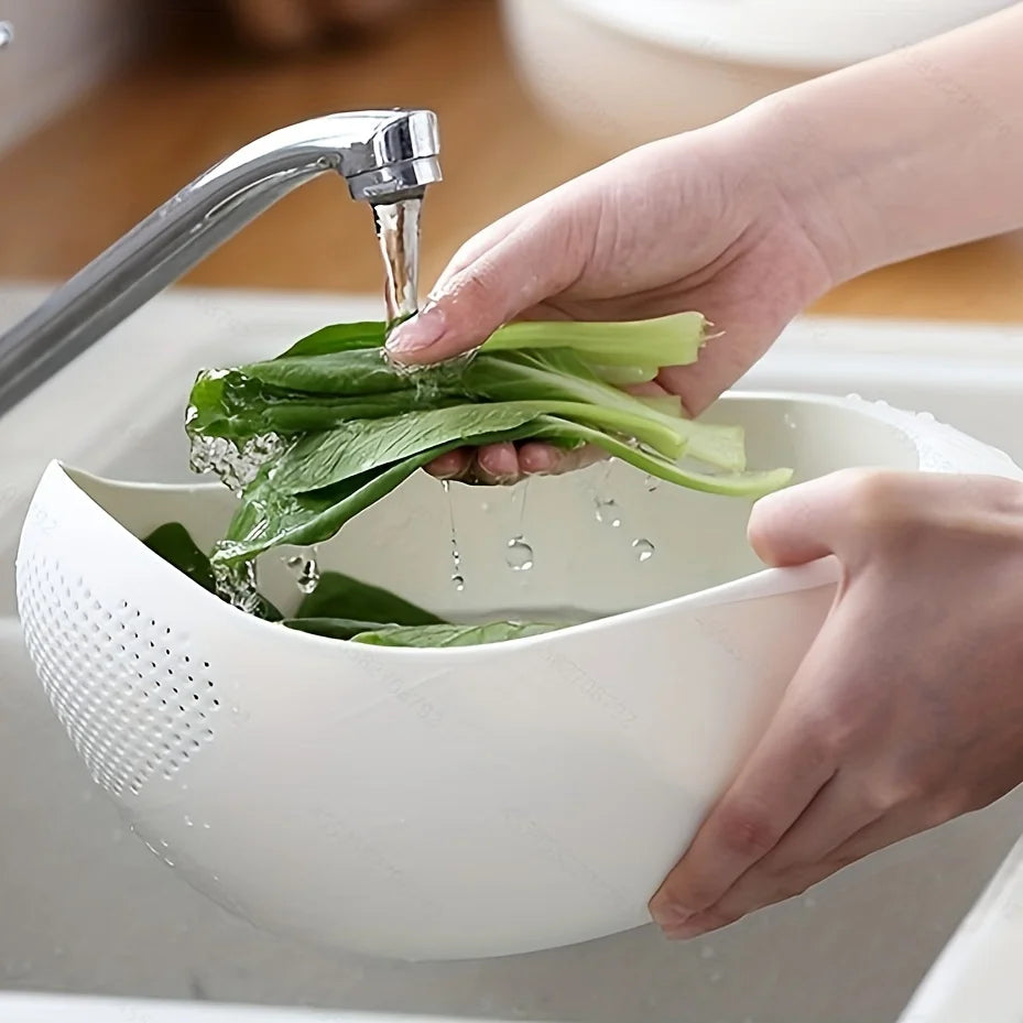 Rice Rinsing Strainer Bowl — Leafy greens being washed under a tap in the white bowl