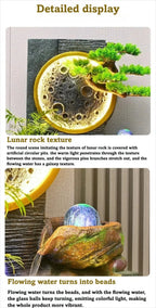 Rockery Water Fountain close-ups of the textured moon, pine-style branches and illuminated rotating glass ball.