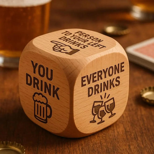 Close-up of wooden drinking die on a table with printed prompts and drink icons
