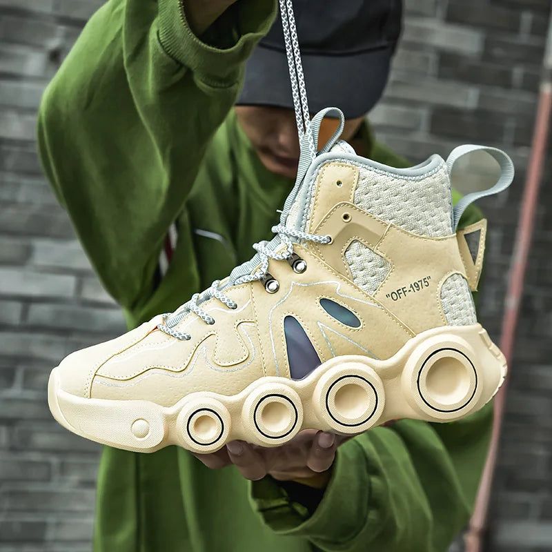 Beige Roller-Inspired Street Sneakers supported by a hand while the patterned laces are held above the shoe