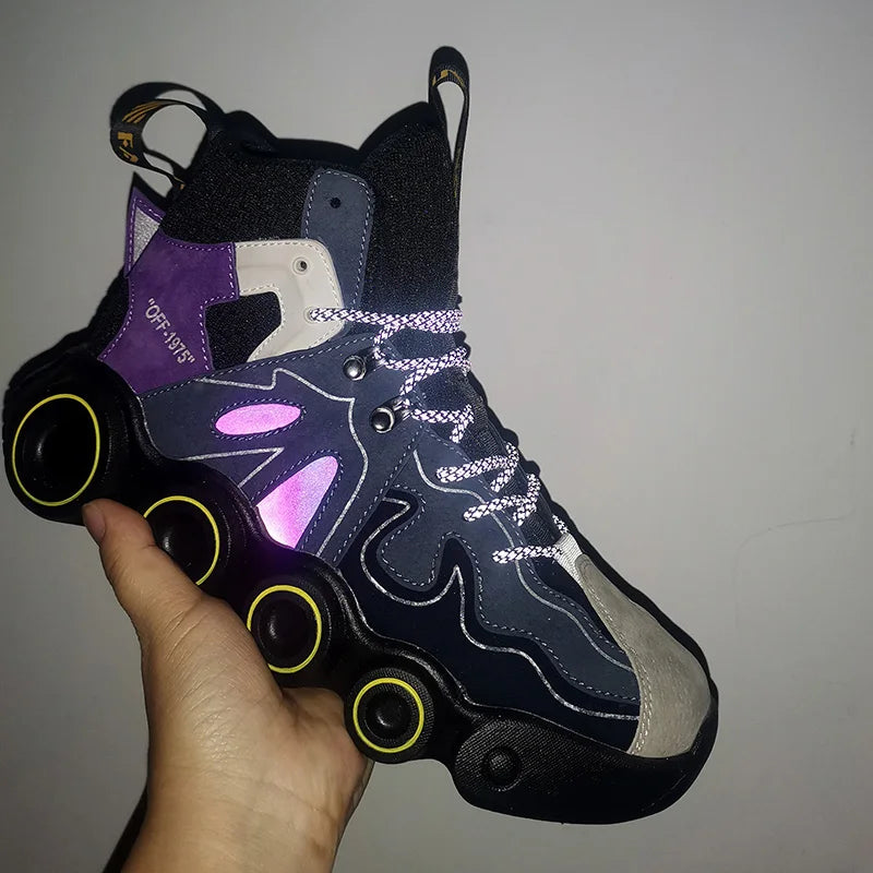 Black Roller-Inspired Street Sneakers held in one hand, showing purple-pink reflections on the side panels